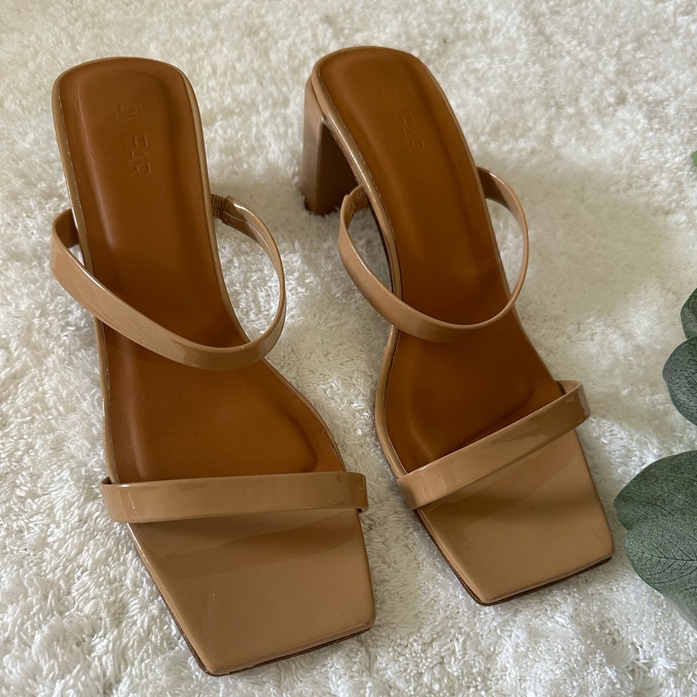 By far patent leather sandals